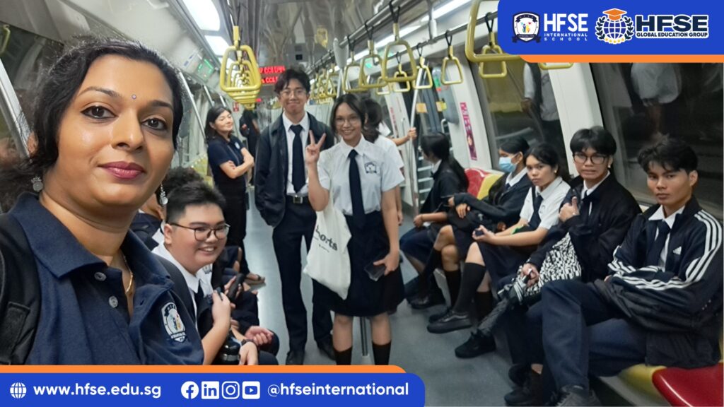 A group picture of a teacher with her class on a train.
