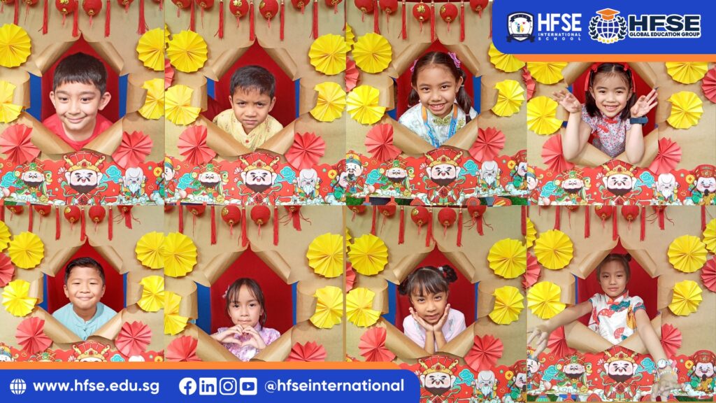 Singapore students posing in a Chinese New Year-themed photo frame.