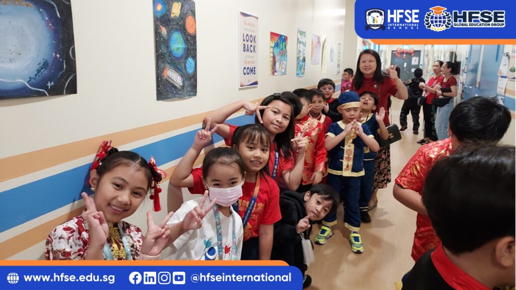 Students in Singapore lined up with their teacher to celebrate Chinese New Year.