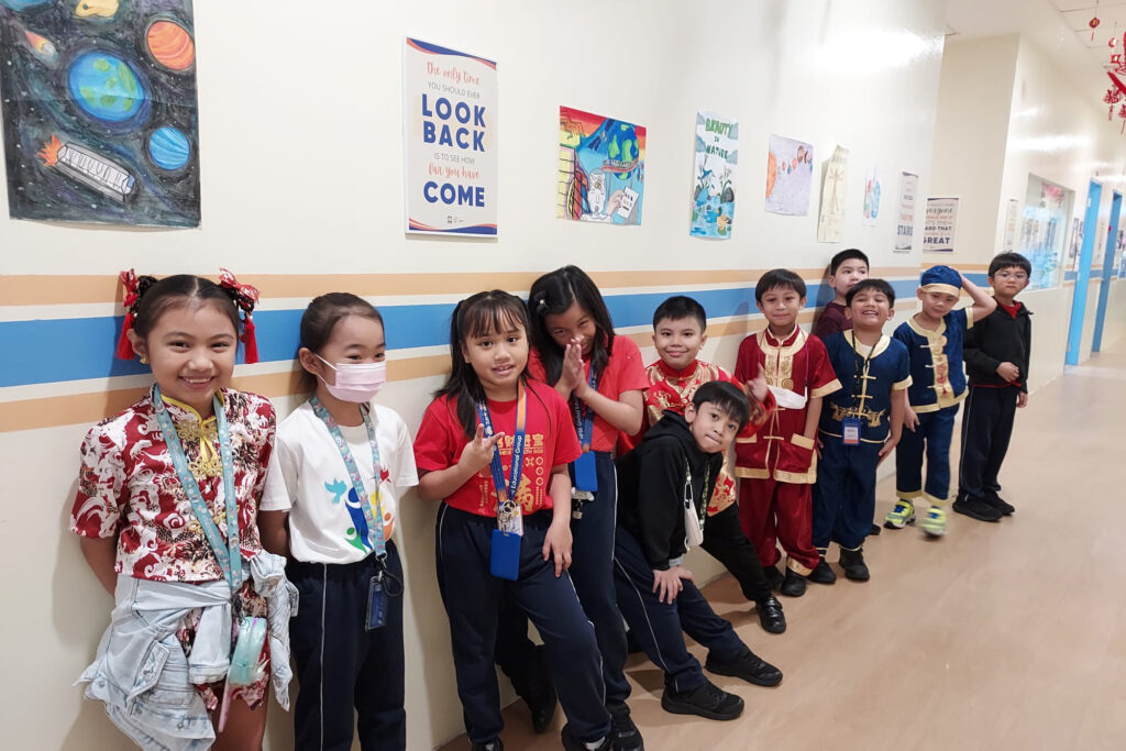 Primary students in Singapore during the Chinese New Year celebration event.