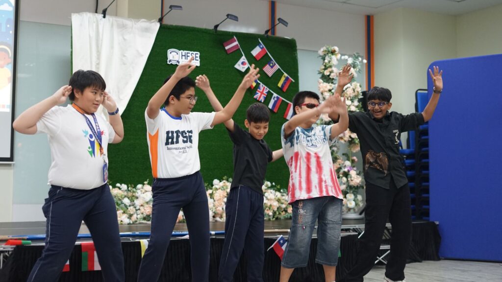 A group of secondary school boys in Singapore dancing.